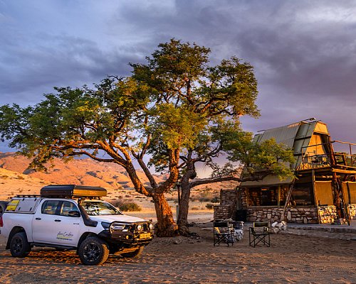 Safari Campsite Namibia featuring 4x4 Asco off-road vehicle with rooftop tent