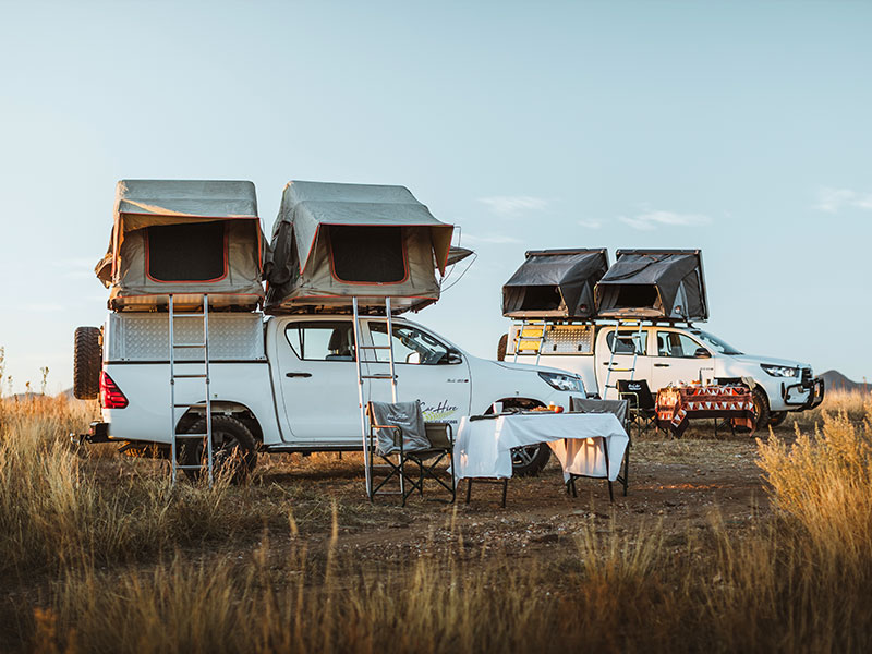 Two Budget Asco 4x4 Self-Drive Rental Cars Camping Namibian Landscape for 3-5 pax
